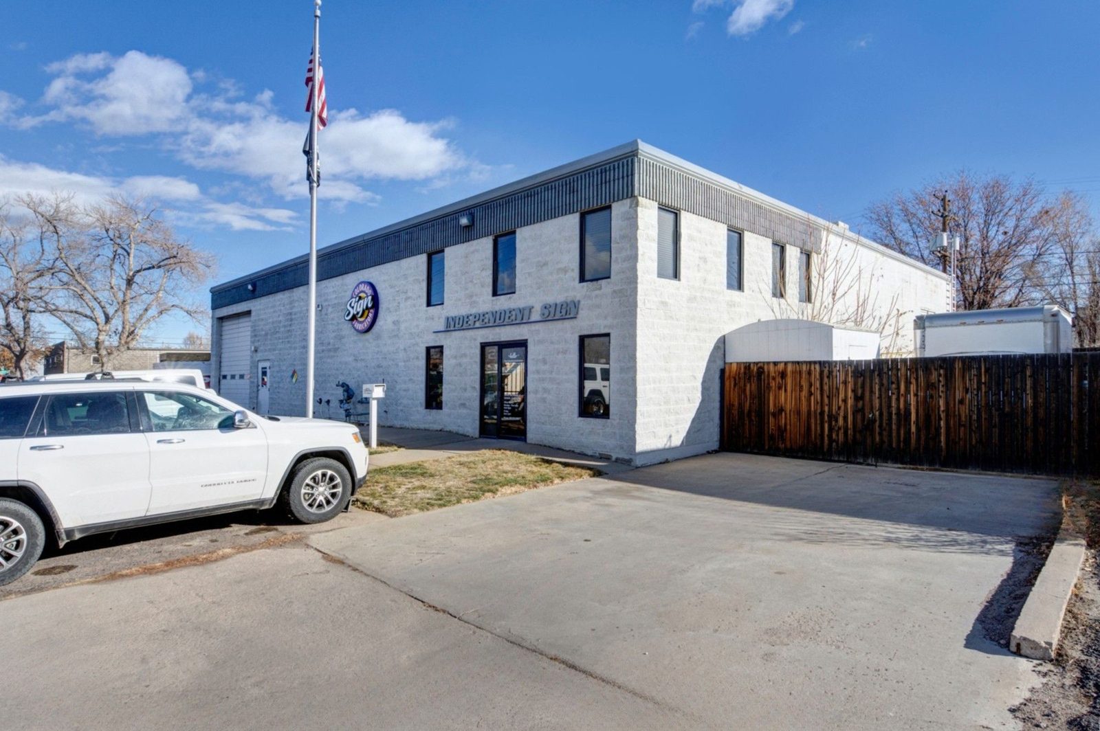 2518 S Delaware Street, Denver, a single story masonry industrial building with warehouse loading door